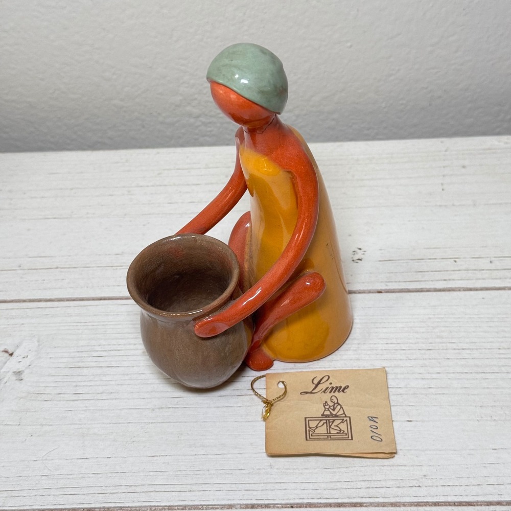 Creative Directions Lime Ceramic Figurine Woman with Pot Orange Yellow 7.25"